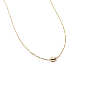 The Straits Finery minimalist necklace in 14k solid gold with fine chain and gold bead