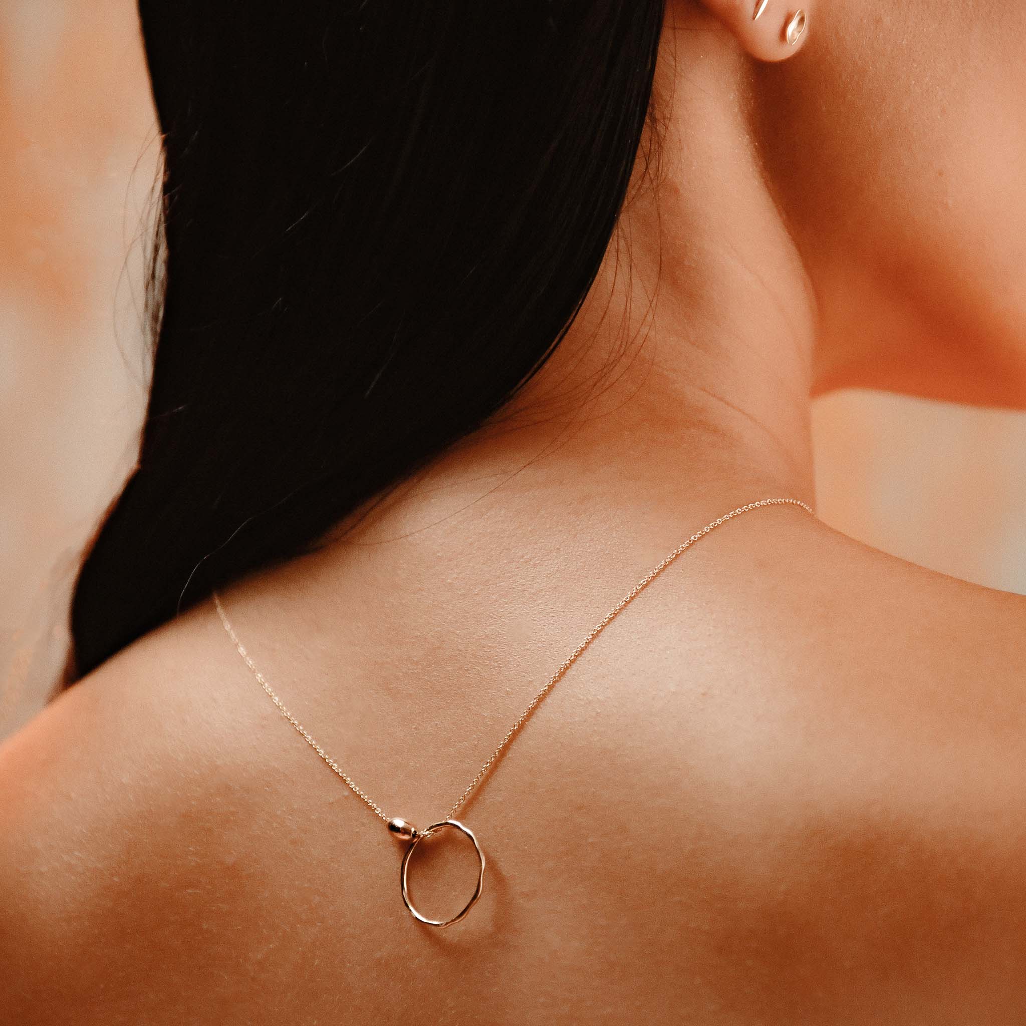 The Straits Finery minimalist necklace in 14k solid gold with fine chain and gold bead