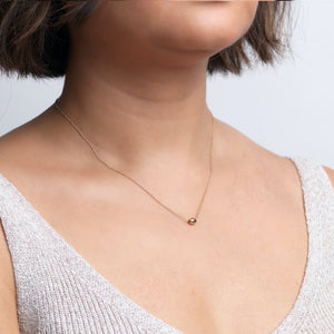 The Straits Finery minimalist necklace in 14k solid gold with fine chain and gold bead