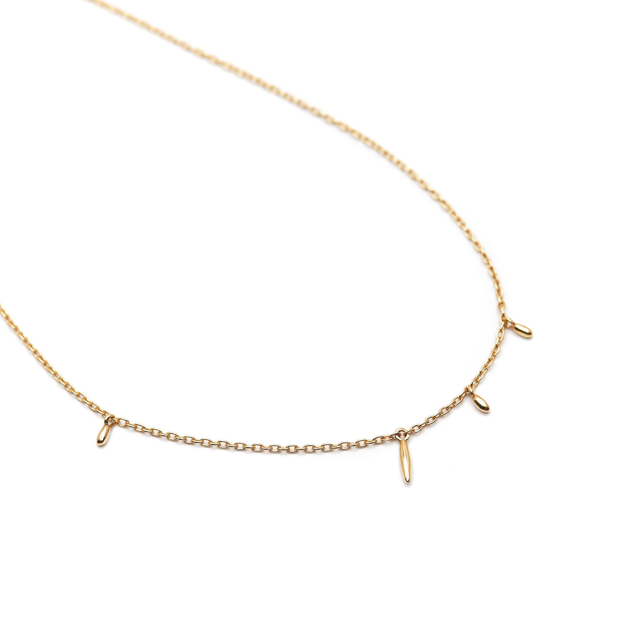 Minimalist solid 14k gold necklace. Delicate fine jewelry.