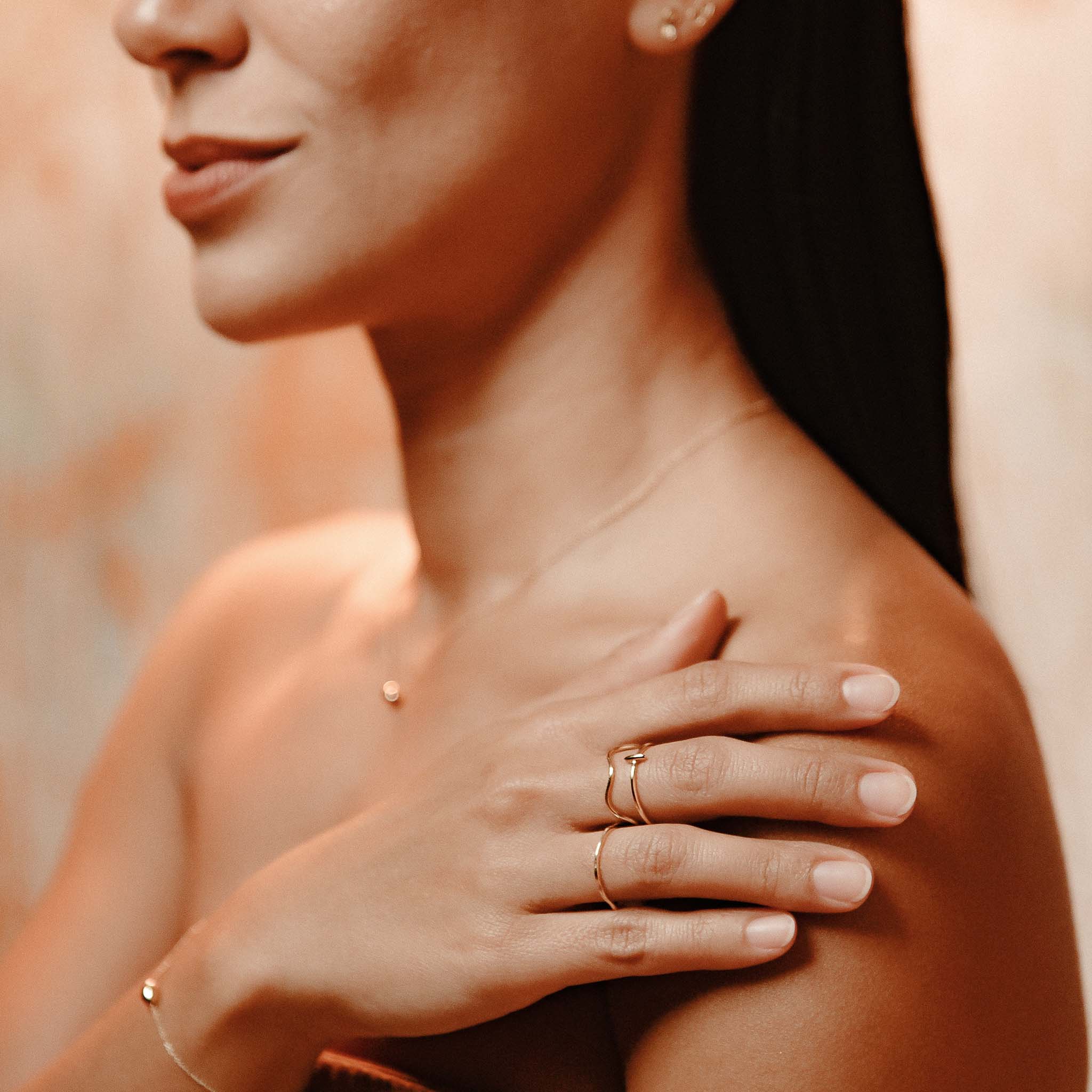 The Straits Finery minimalist stacking ring in 14k solid gold with organic shape