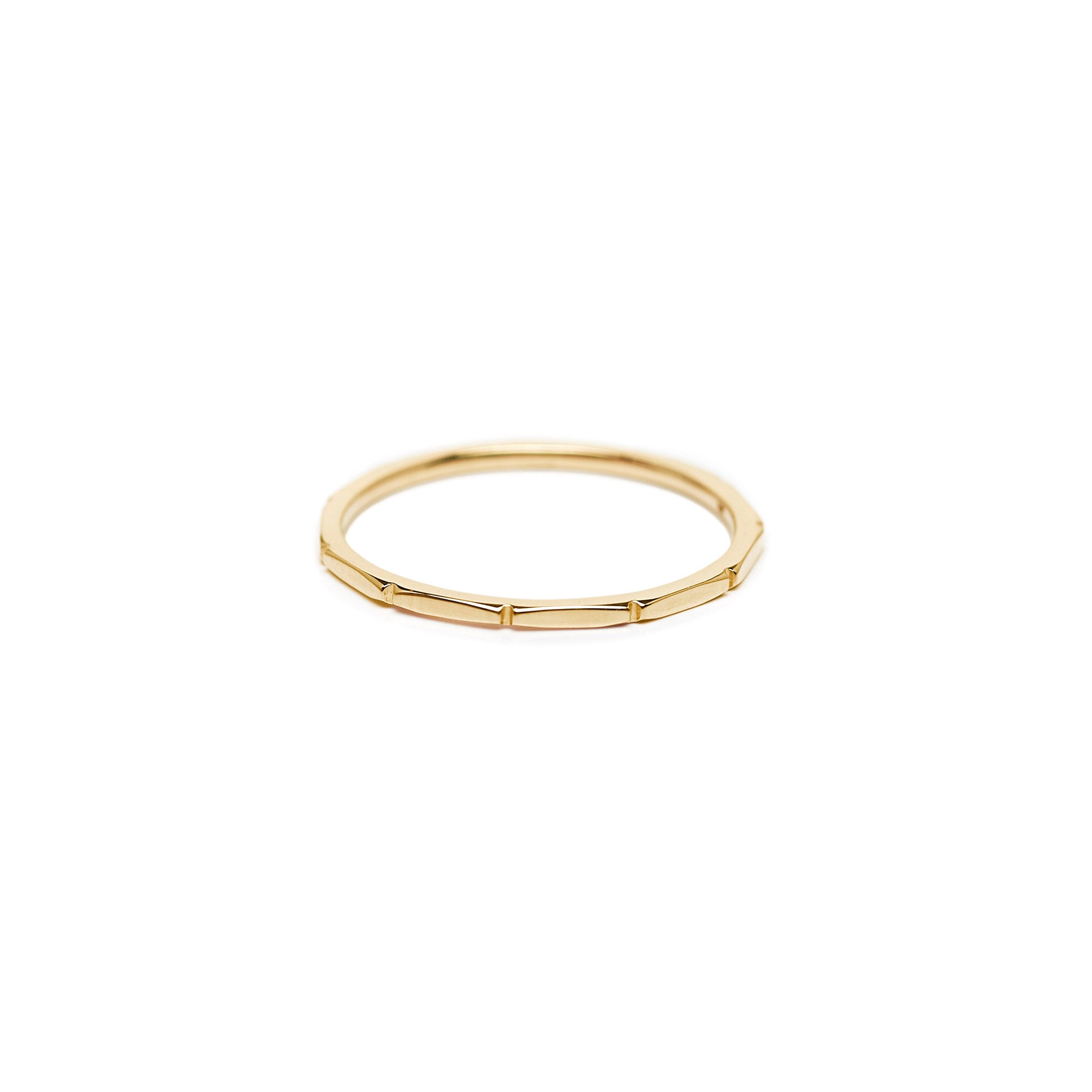 minimalist sold 14k gold jewelry. thin bamboo fine ring