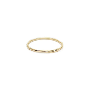 The Straits Finery minimalist stacking ring in 14k solid gold with organic shape